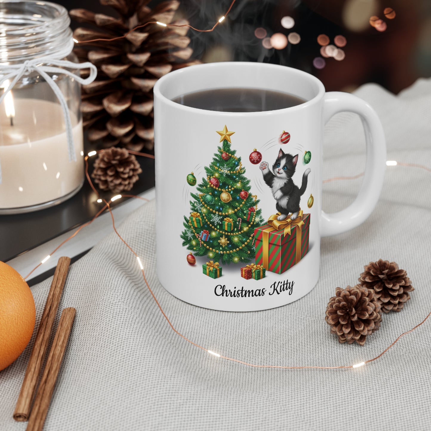 White mug with Christmas Kitty design featuring a cat on a tree, surrounded by festive decor.